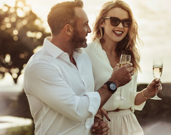 Happy couple with champagne glasses