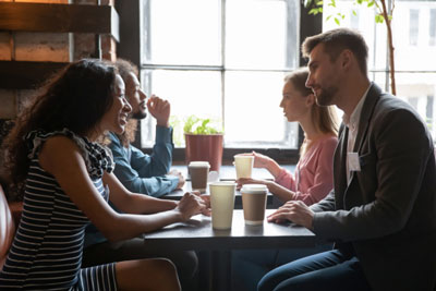 Singles having fun at a speed dating event